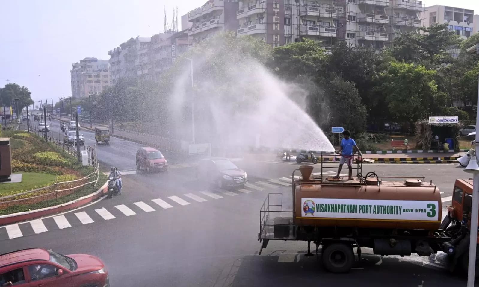 Visakhapatnam Port Authority Takes Heatwave Challenge with Water Fogging